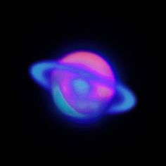 a blurry image of the planet saturn