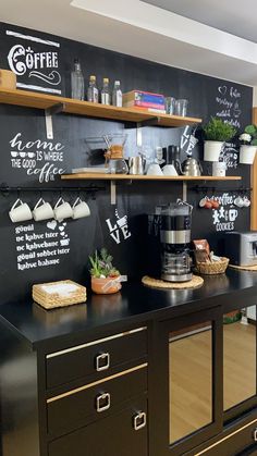 a coffee shop with blackboard and chalk writing on the wall, shelves filled with pots and pans