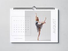 a calendar with an image of a ballerina