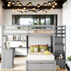 a bunk bed with drawers underneath it in a room filled with furniture and lights hanging from the ceiling