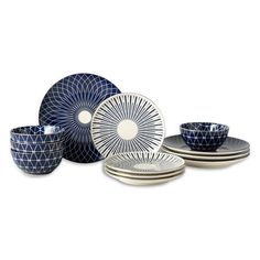 blue and white dinnerware set with geometric designs