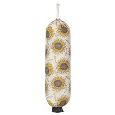 a sunflower print bag hanging from a string