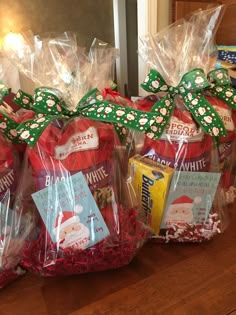 christmas treats wrapped in plastic and sitting on a table