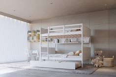 a white bunk bed sitting in the middle of a room next to a teddy bear