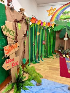 a classroom decorated with jungle signs and trees