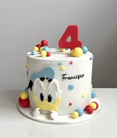 a birthday cake with the number four on it