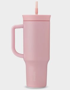 a pink coffee cup with a straw sticking out of it's top and lid