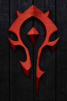 an image of a red logo on a wooden wall with the word warcraft written below it