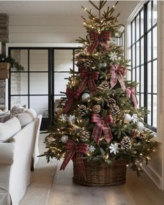 a decorated christmas tree in a living room