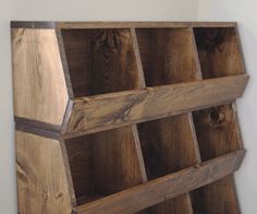 a close up of a wooden shelf with wood planks