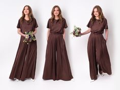 three women in brown outfits standing next to each other and holding bouquets with flowers