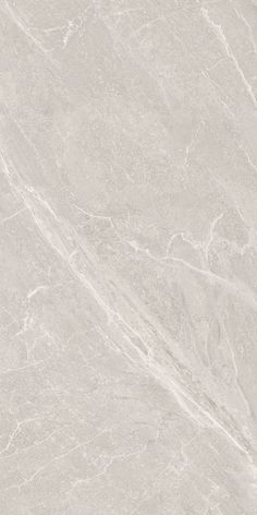 a white marble textured surface with grey streaks