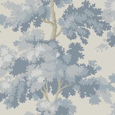 a blue and white wallpaper with trees on it