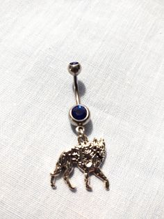 "This is a brand new CUSTOM MADE DAZZLING Belly Button Ring 14 gauge surgical stainless steel curved navel ring belly barbell with a FULL BODY STALKING WOLF WITH DETAILED FRONT AND REAR SILVER ALLOY CHARM ON A DOUBLE DAZZLING COBALT BLUE CZ STONE BANANA BAR approx 3/4 inches long from the top screw ball & the charm is 3/4 of an inch across and overall with barbell 1 3/4\" AWESOME BODY PIERCING JEWELRY - EXCELLENT QUALITY - UNIQUE UNISEX NAVEL RING - WILDLIFE JEWELRY - MOUNTAIN ANIMALS" Banana Bars, Navel Rings, Body Piercing Jewelry, Belly Rings, Cz Stone, Cobalt Blue, Piercing Jewelry, Cobalt, Belly Button Rings