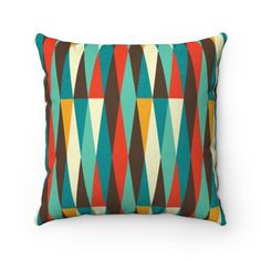 a multicolored pillow on a white background