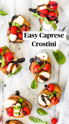 small crostini with tomatoes, mozzarella and spinach leaves on top