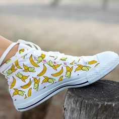 These cute yellow banana shoes are sure to attrack some attention ! Our custom made shoes will make the best gift for any occasion! All of our sneakers are custom-made-to-order and handcrafted to the highest quality standards Check out more of our footwear here: https://www.etsy.com/shop/unicornshoesshop/ Product Name: Yellow Banana Shoes | Banana Sneakers | Cute Shoes | Banana Lover Gifts | Custom High Top Converse Style Sneakers For Adults Women & Men Product Features; ▶ Full canvas double Shoes Artwork, Sneakers Cute, Custom Wedding Shoes, Yellow Banana, High Tops Sneakers, Low Top Converse, Style Converse, High Top Converse, Custom Made Shoes