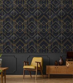 a chair and table in front of a wall with geometric design on the back side