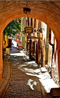 an alley way in the middle of a city