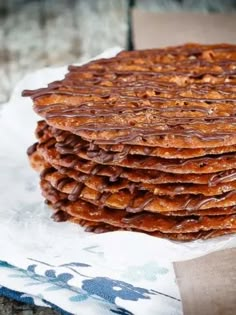 a stack of cookies sitting on top of a piece of paper