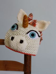 "This fun and whimsical unicorn hat is absolutely magical! Fully hand made from my original design, this hat is both fun and warm! This hat would make a wonderful gift! Please select desired size. Hat sizing info: 0-3 months: 15\" circumference 3-6 months: 17\" circumference 6-12 months: 18\" circumference 12 months-2T: 19\" circumference 3T-4T: 20\" circumference 4T-tween: 21\" circumference adult small: 22\" circumference adult medium: 23\" circumference adult large: 24\" circumference Care in Whimsical Handmade Beanie Costume Hat, Whimsical Hand Knitted Adjustable Mini Hats, Whimsical Handmade Beanie Hat, Cute White Crochet Hat For Gifts, Cute White Crochet Hat For Gift, Handmade Whimsical Beanie Hats, Cute White Crochet Hat As Gift, Whimsical Handmade Bonnet, One Size Fits Most, Handmade Whimsical Bonnet, One Size Fits Most