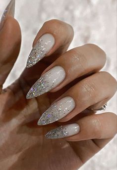 New Years Nails Almond Shape Sparkle, White Silver Glitter Nails, New Years Nails Acrylic Almond, Sparkling White Nails, Winter Pointy Nails, Pink With Silver Glitter Nails, Nail Inspo White Design, Almond Long Acrylic Nails, Nye Nail Ideas New Years Eve