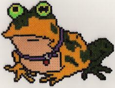 a close up of a pixellated image of a frog with green eyes and an eye patch