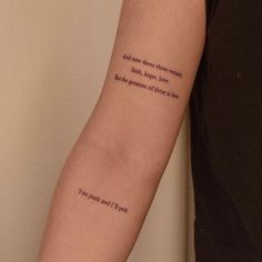 a person with a tattoo on their arm that says, and then there is magic