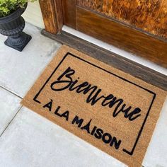 a welcome mat on the front door to someone's house