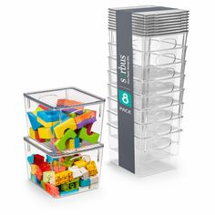 two clear storage containers with bins filled with different colored blocks and toys in them