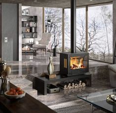 a living room filled with furniture and a fire place in the middle of it's walls