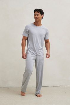 Introducing your stay at home uniform. Lounge in comfort all day in this incredibly soft and breathable pajama set. This set includes straight leg pajama pants and a matching raglan cut t-shirt. Made from our signature ultra-soft and moisture-wicking fabric blend. Made in Canada. 93% Viscose from Bamboo / 7% Spandex. Fits true to size. Available in S, M, L, XL. S (28-30), M (32-34), L (36-38), XL (40-42). Machine washable and dryer friendly. Relaxed Fit Sleep Set With Long Pants, Casual Sleep Sets With Long Pants, Casual Sleepwear Set With Long Pants, Comfortable Long Pants Sleepwear, Short Sleeve Tops With Elastic Waistband For Loungewear, Relaxed Fit Sets With Long Pants For Relaxation, Relaxed Fit Long Pants Set For Relaxation, Cotton Athleisure Sets For Loungewear, Casual Home Sets With Long Pants