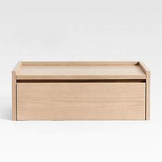 an empty wooden box on a white background