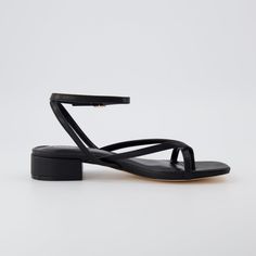 Meet Novella, the perfect heeled sandal for any occasion! With a soft vegan leather upper, Novella features an adjustable ankle strap, memory foam padding and a flexible, long lasting traction outsole for all-day comfort. Plus, the classic 1 inch block heel gives you a stylish, sophisticated blend, that can be suited towards any look. Bridesmaid Flat Shoes, Low Heels Sandals, Black Low Heel Sandals, Low Block Heels Outfits, 1 Inch Heels Sandals, Cute Low Heels, Sandals For Graduation, Flat Formal Shoes, Dress With Flat Sandals