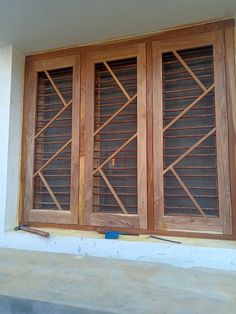 a window with wooden slats on it