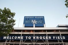 the kentucky wildcats welcome to kroger field sign is on top of the building