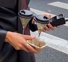 Someone holding a cup holder with two martinis with olives (dry martinis) in one hand and an old cellphone, thick and looks like from around  95. Wallpaper Pastel, Mbti, Mood Boards, Dream Life, Martini, Aesthetic Pictures, Mood Board, Vision Board, Champagne