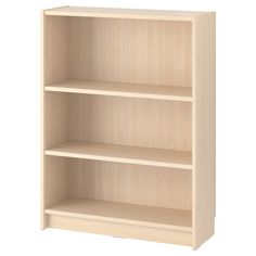 an empty wooden bookcase on a white background