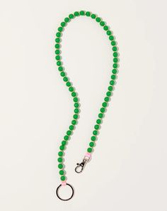 Perlen Long Keyholder in Green on Rose | Ina Seifart | Covet + Lou | Covet + Lou Jewerly Holders, Beaded Lanyards, Jewel Box, Green Rose, Pony Beads, Steel Ring, Pink Ribbon, Key Holder, Wooden Beads