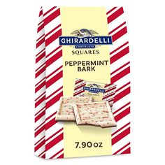 a box of peppermint bark candy on a white and red striped paper wrapper