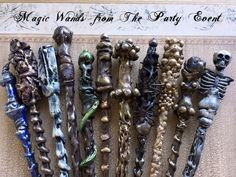 there are many different types of decorative items on the wall with words above them that read magic wands from the party event