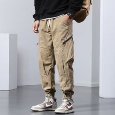 Men's Pockets Sports Cargo Pants
Features：

 	Product ID:CP0114
 	Material:Cotton
 	Season:Spring,Summer,Autumn,Winter
 	Color:Black,Army Green,Khaki

Size Chat： Khaki Cargo Pants For Winter Outdoor Activities, Winter Khaki Cargo Pants For Outdoor Activities, Baggy Sweatpants With Pockets For Outdoor Activities, Hip Hop Style Straight Leg Outdoor Pants, Hip Hop Straight Leg Outdoor Pants, Hip Hop Straight Leg Pants For Outdoor, Khaki Sweatpants With Pockets For Streetwear, Hip Hop Style Pants For Outdoor Activities With Pockets, Outdoor Sportswear Joggers With Pockets