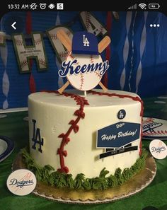 a baseball themed birthday cake on a table