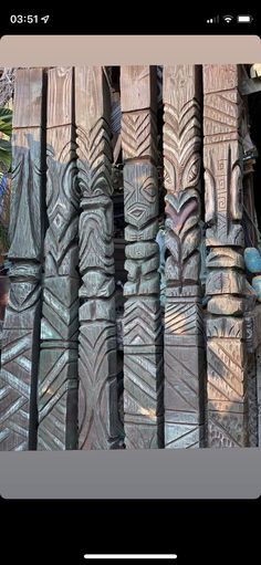 an image of wooden carvings on the wall