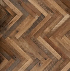 an image of wood flooring that looks like herringbones