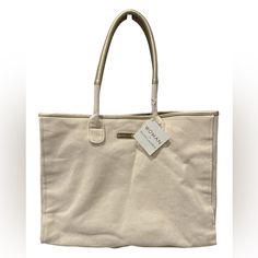 Ralph Lauren Canvas Tote Beach Bag With Golden Handles New With Tags, The Inside Lining Has Some Dirt Stains As Shown On Last Two Pictures Ralph Lauren Canvas Tote. Cream Colored Canvas With Gold Accents And Trim. Attached Small Bag For Phone, Money Etc That Snaps On And Off. Fully Lined In Waterproof Lining. Perfect For The Beach Or Travel. Measures: 16" L X 8"W X 11" H Tote Beach Bag, Ralph Lauren Bags, Dirt Stains, Beach Tote Bags, Cream And Gold, Small Bag, Womens Tote Bags, Beach Bag, Gold Accents