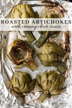 roasted artichokes on foil with text overlay