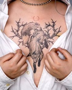 a woman with a tattoo on her chest