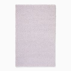 a light purple rug on a white background