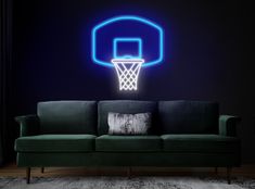 a couch in front of a neon basketball hoop